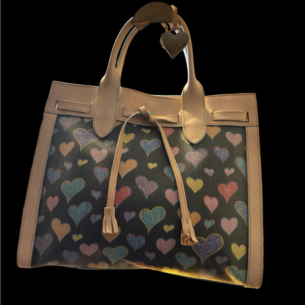 Dooney & Bourke multicolored heart satchel in coated canvas with leather trim.